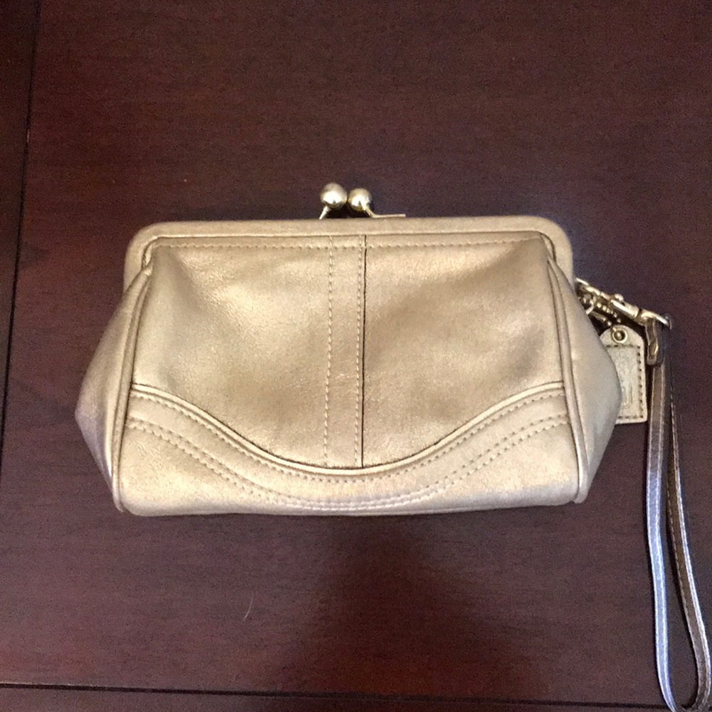 Coach gold wristlet